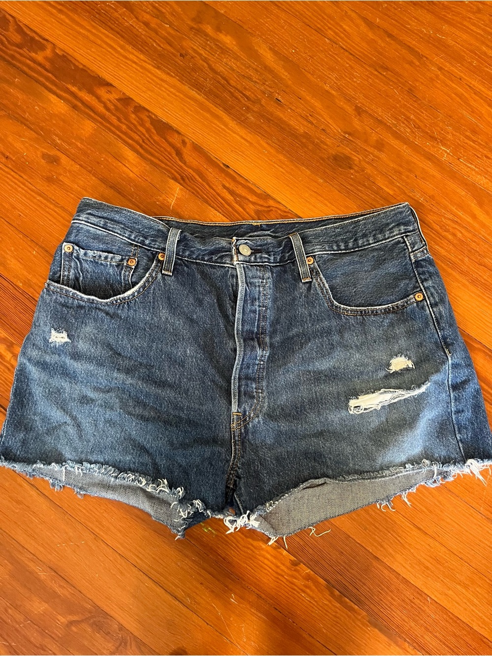 Levi’s High-Rise Dark Blue Distressed Denim Shorts